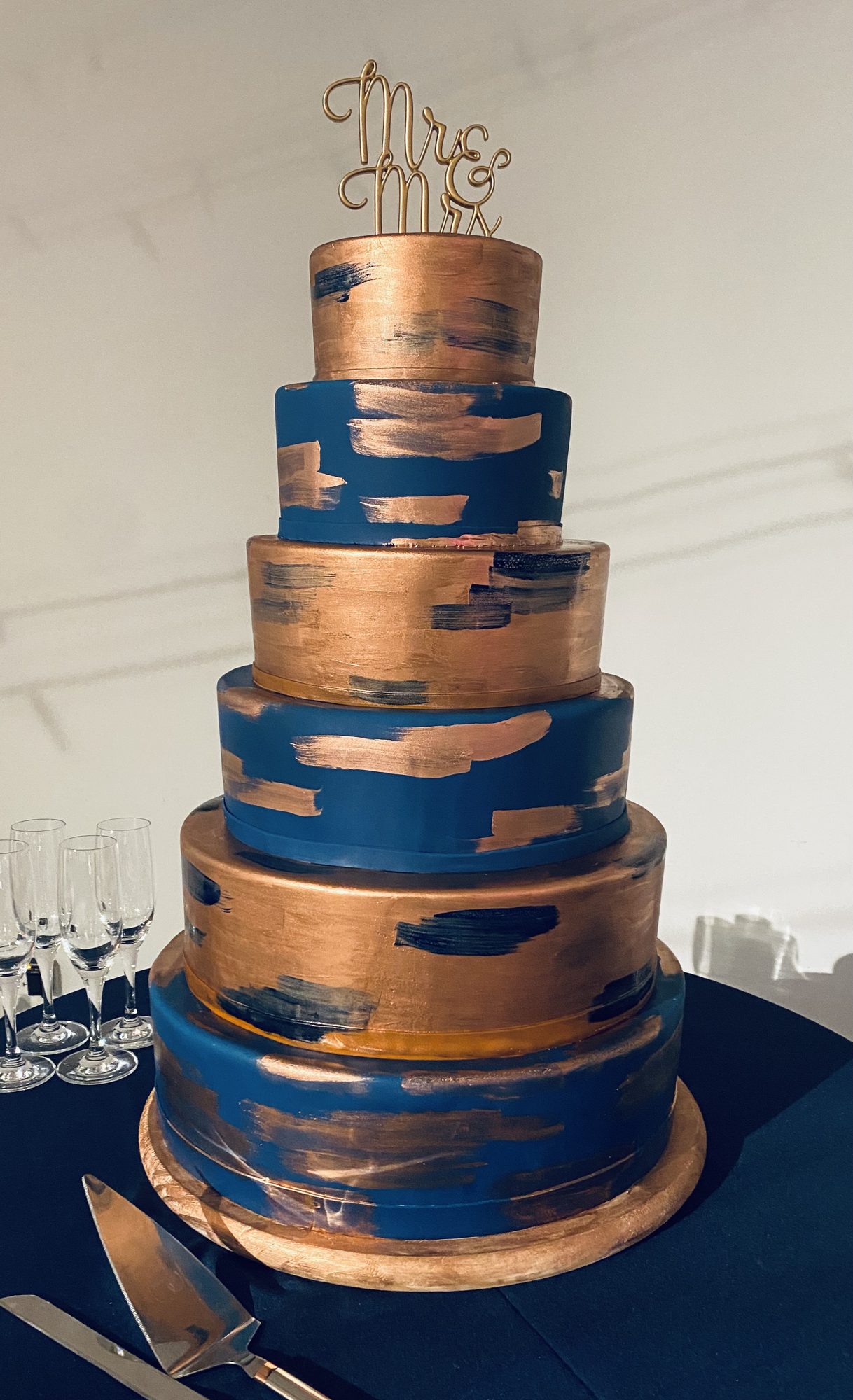 Navy and copper tiered wedding cake